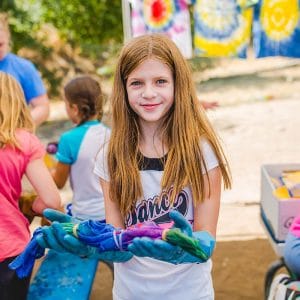 Camper doing tie dye