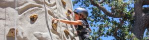 Camper Climbing the Rockwall