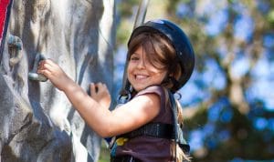 Girl rock climbing