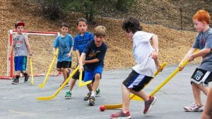 Campers playing hockey