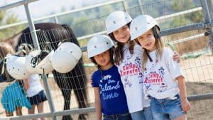 Campers with their horse helmets