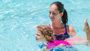 Camper learning to swim