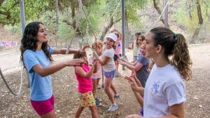 Campers at low ropes course