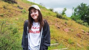 Girl in Camp Kinneret Shirt and Sweater