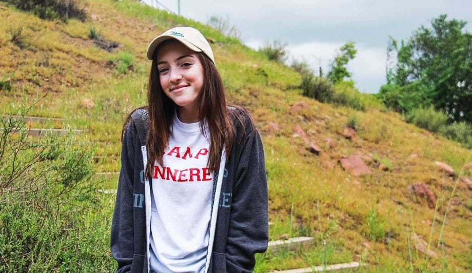 Girl in Camp Kinneret Shirt and Sweater