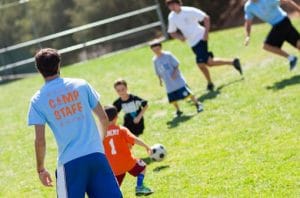 Campers playing soccer