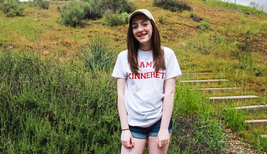 Girl in Camp Kinneret Shirt