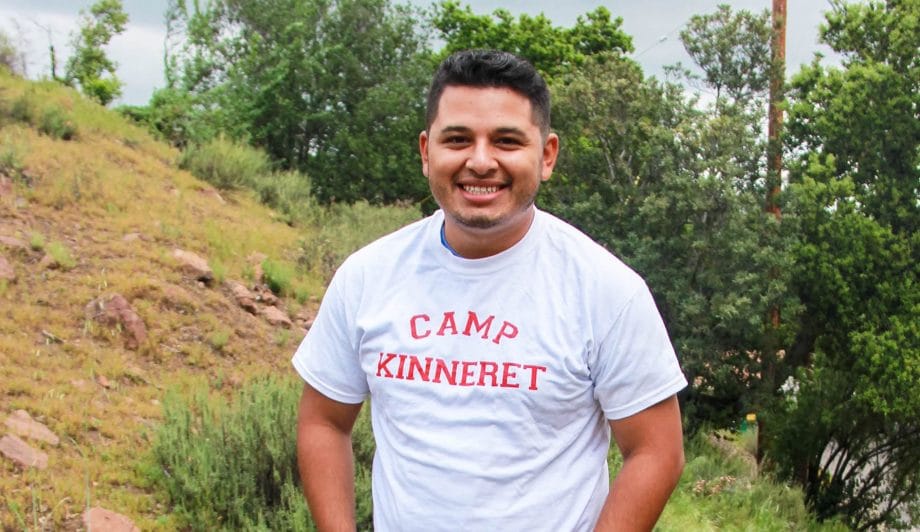 Male in Camp Kinneret Shirt