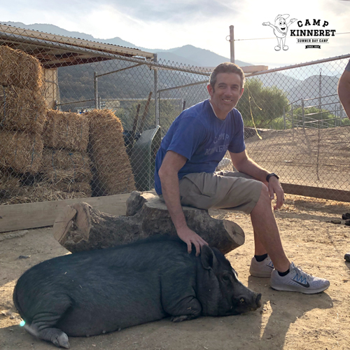 Ryan petting Pickles our pig