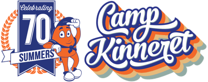 Logo for Camp Kinneret featuring a banner that reads "Celebrating 70 Summers," a cartoon orange mascot in a scarf, and stylized "Camp Kinneret" text with a retro background.