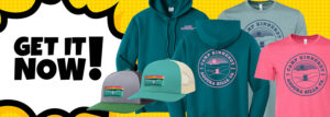 Various Camp Kinneret branded clothing and hats are displayed on a yellow background with the text "Get It Now!" in bold letters.